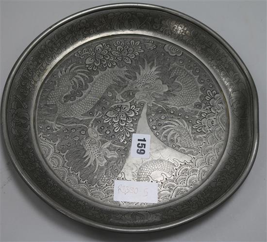 A Chinese pewter tray, engraved with dragons
